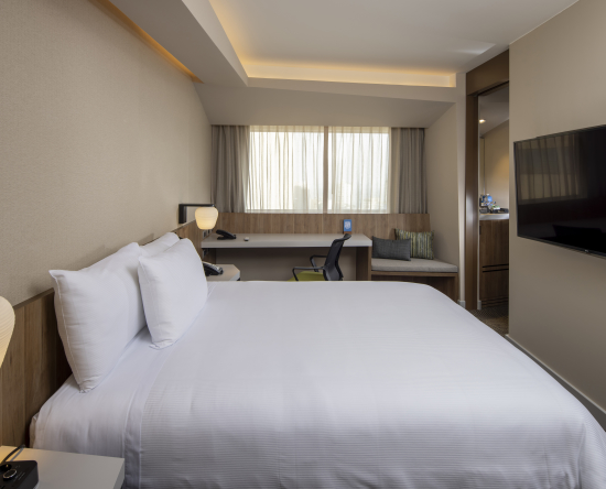 Dormitorio de la suite con cama Queen
